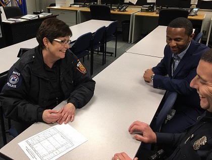 Police Officers talking at a table