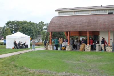 People surrounding Lakeshore Park Building